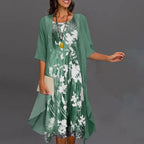 Stylish Three-Quarter Sleeve Dress Featuring an Elegant Floral Pattern