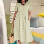 Ester Cotton Midi Dress" can be rephrased as "Ester Midi Dress Made from Cotton.