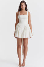 Stellar Grace: The White Bow Dress
